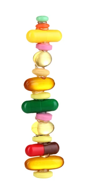 Capsule e pillole isolate su bianco — Foto Stock