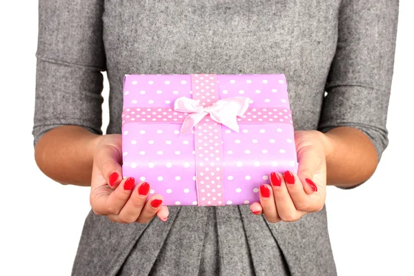 Woman holds box with gift on white background close-up — Stockfoto