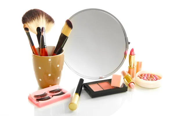 Cosmetics near mirror isolated on white — Stock Photo, Image