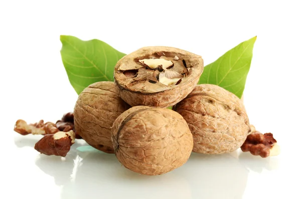 Walnuts with green leaves, isolated on white — Stock Photo, Image