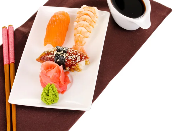 Delicious sushi served on plate isolated on white — Stock Photo, Image