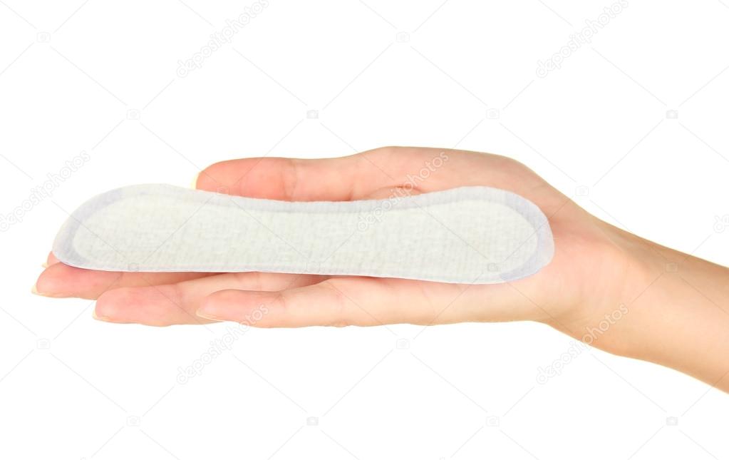 woman's hand holding a daily sanitary pad on white background close-up