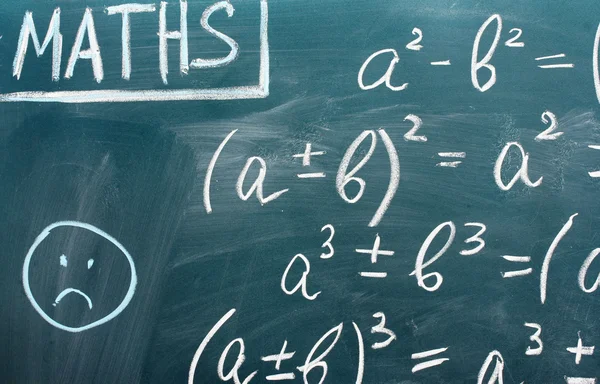 Math formulas written on the desk — Stock Photo, Image