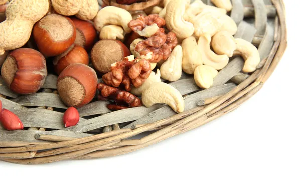 Assortiment van smakelijke noten, geïsoleerd op wit — Stockfoto