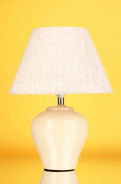 Table lamp on yellow background — Stock Photo, Image