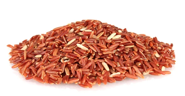 Red rice uncooked in a heap isolated on a white background — Stockfoto