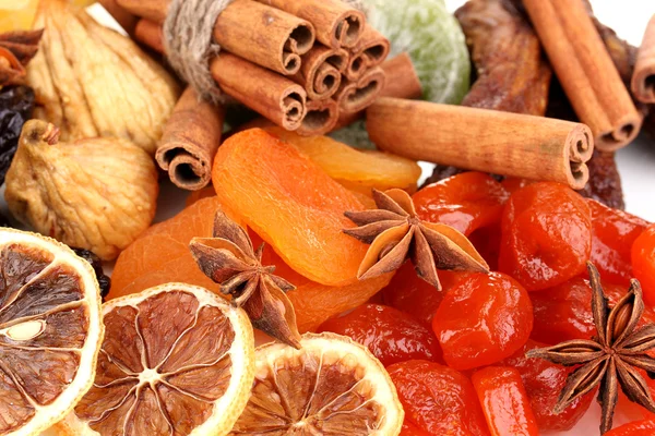 Dried fruits with cinnamon and star anise close-up — Stock Photo, Image
