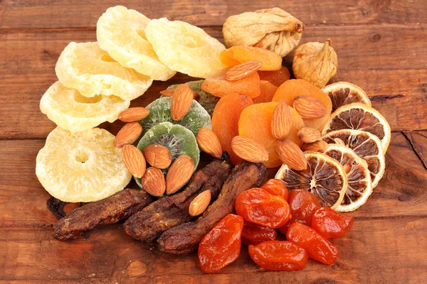 Dried fruits on wooden background — Stock Photo, Image