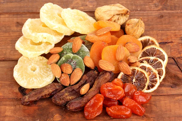 Dried fruits on wooden background — Stock Photo, Image