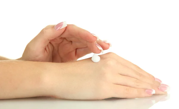 Hermosas manos de mujer con crema, aisladas en blanco — Foto de Stock