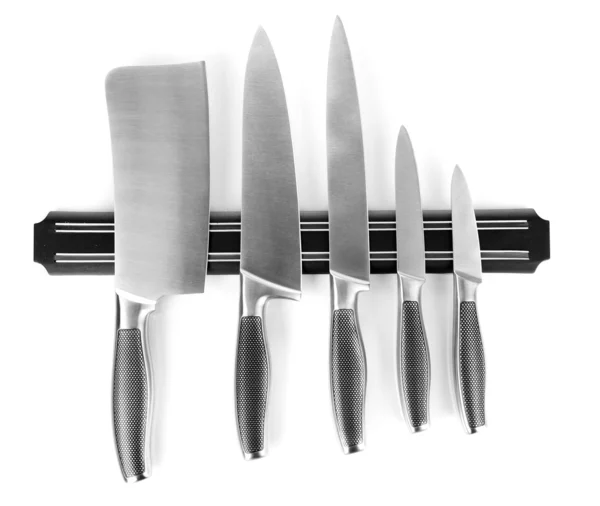 Set of knives on magnetic holder isolated on white — Stock Photo, Image