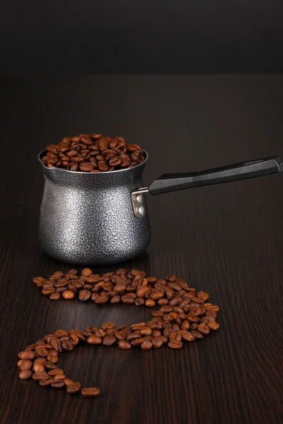 Coffee maker on brown table — Stock Photo, Image