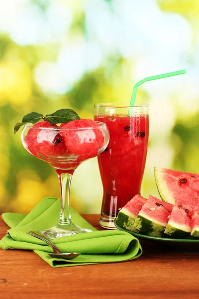 Refreshing desserts of watermelon on green background close-up — Stock Photo, Image