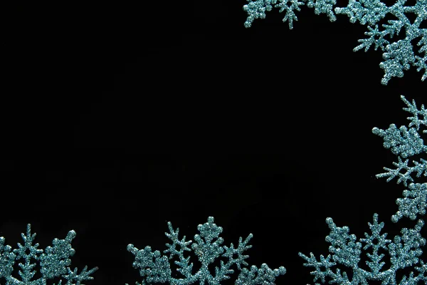 Piękne płatki śniegu na czarnym tle — Zdjęcie stockowe