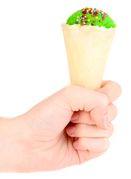 Scoop of kiwi ice cream in the waffle cone decorated with sprinkles — Stock Photo, Image