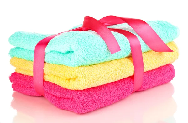 Colorful towels with ribbon isolated on white — Stock Photo, Image