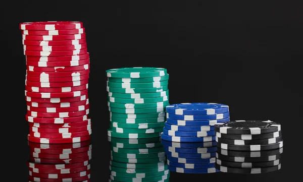 Casino chips isolated on black — Stock Photo, Image