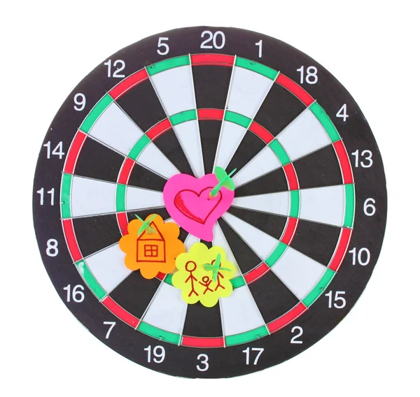 Darts with stickers depicting the life values isolated on white. The darts hit the target. — Stock Photo, Image