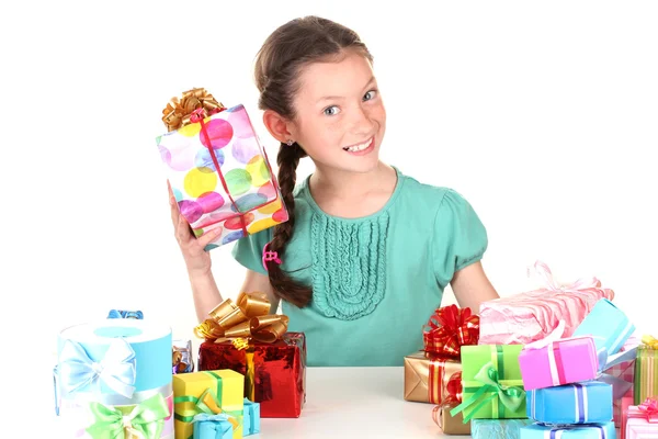 Little girl with gifts isolated on white — Stock Photo, Image