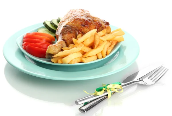 Roast chicken with french fries and vegetables on plate, isolated on white — Stock Photo, Image