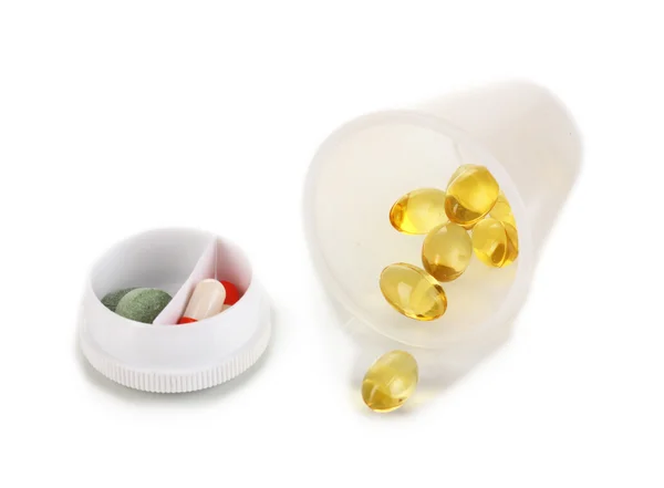 Distribuidores para comprimidos com comprimidos isolados em branco — Fotografia de Stock