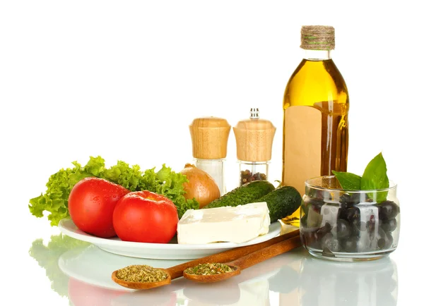 Ingredients for a Greek salad isolated on white background Royalty Free Stock Images