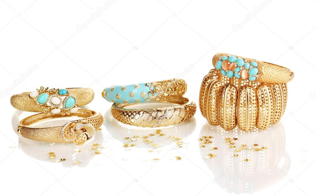 Elegant and fashion golden bracelets isolated on white background