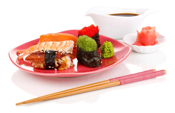 Delicious sushi served on red plate isolated on white — Stock Photo, Image