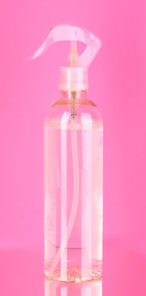 Розовый освежитель воздуха на розовом фоне — стоковое фото