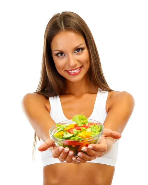 Bela jovem com salada, isolada em branco — Fotografia de Stock