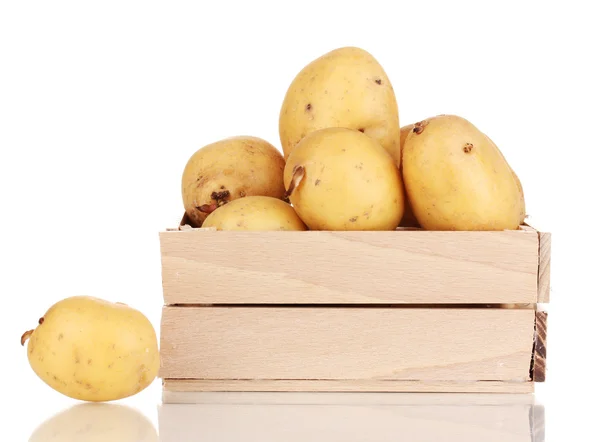 Ripe potatoes on wooden box isolated on white — Stock Photo, Image