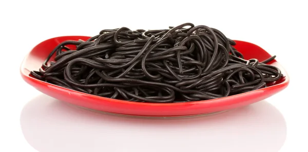 Black spaghetti isolated on white — Stock Photo, Image