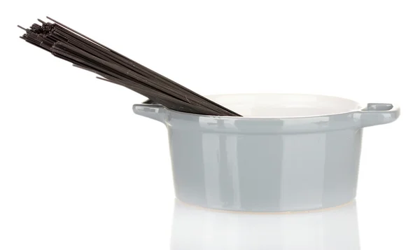 Black spaghetti in pan isolated on white — Stock Photo, Image
