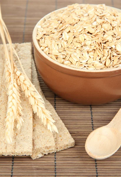 Brown bowl full of oat flakes — Stock Photo, Image