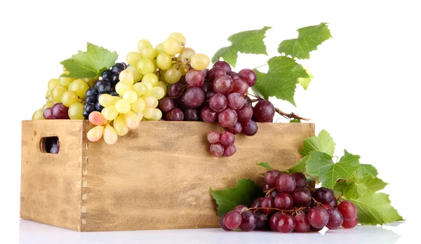 Assortment of ripe sweet grapes in wooden crate, isolated on white — Stock Photo, Image