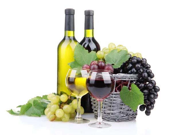 Bottles and glasses of wine and grapes in basket, isolated on white — Stock Photo, Image