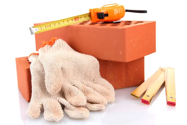 Ziegel, Roulette und Handschuhe isoliert auf weiß — Stockfoto