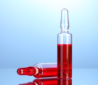 mavi arka plan üzerinde tıbbi ampul