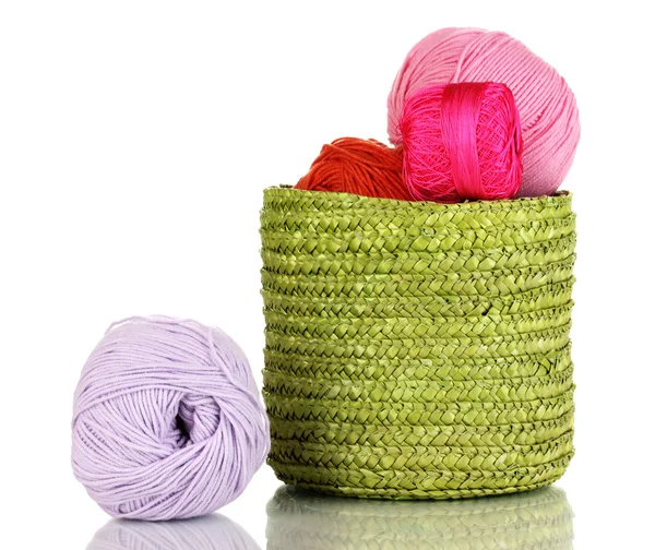 Colorful yarn for knitting in green basket isolated on white — Stock Photo, Image