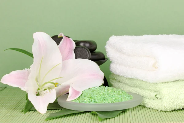 Beautiful spa setting on green background — Stock Photo, Image