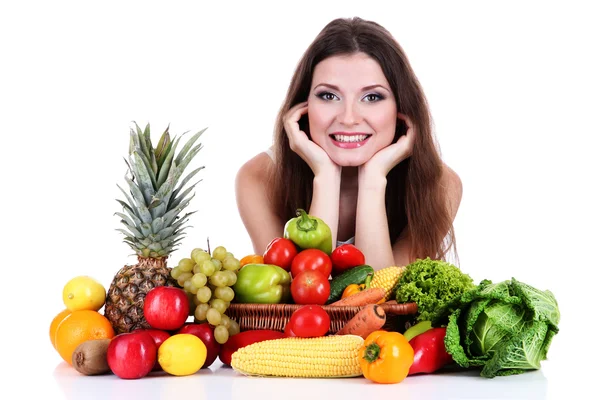 Schöne Frau mit Gemüse und Obst auf dem Tisch isoliert auf weiß — Stockfoto