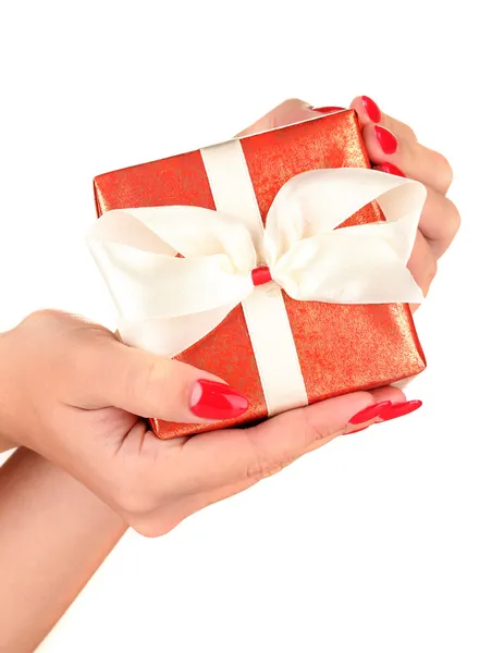 Woman holds box with gift on white background close-up — 图库照片