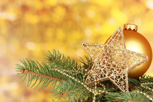 Christmas decoration on yellow background — Stock Photo, Image