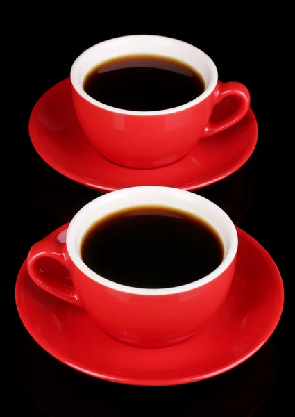 A red cups of strong coffee isolated on black — Stock Photo, Image