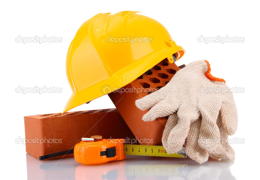 Helmet, roulette, bricks and gloves isolated on white