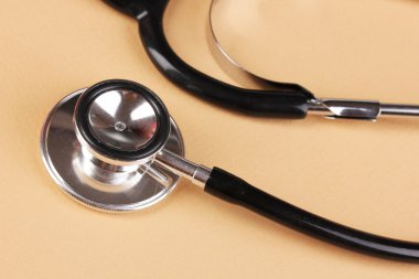 bej renkli arka plan üzerinde stetoskop