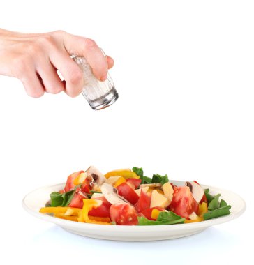 el ekleyerek tuz tuz shaker üzerinde beyaz izole kullanarak