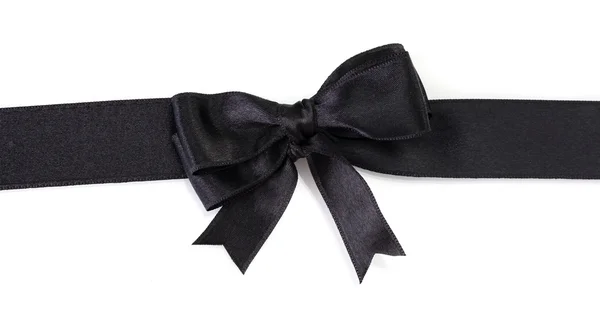 Black bow on ribbon isolated on white — Stock Photo, Image