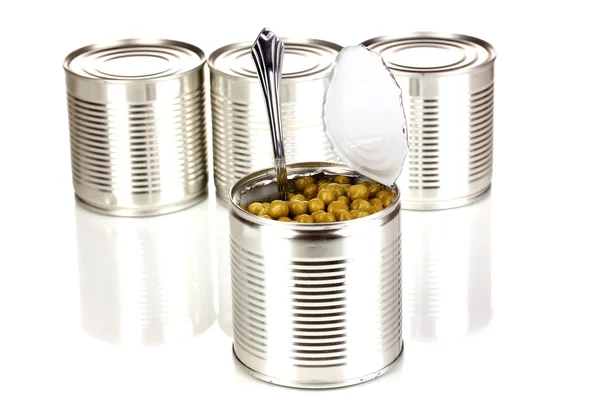 Open tin can of peas with spoon and closed cans isolated on white — Zdjęcie stockowe