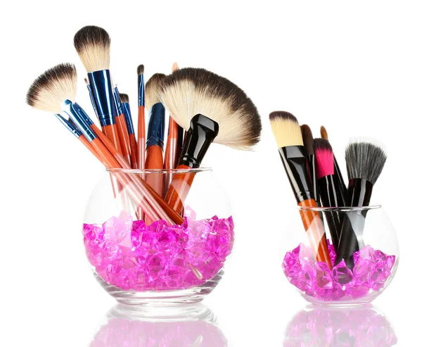 Make-up brushes in two bowls with stones isolated on white — Stock Photo, Image